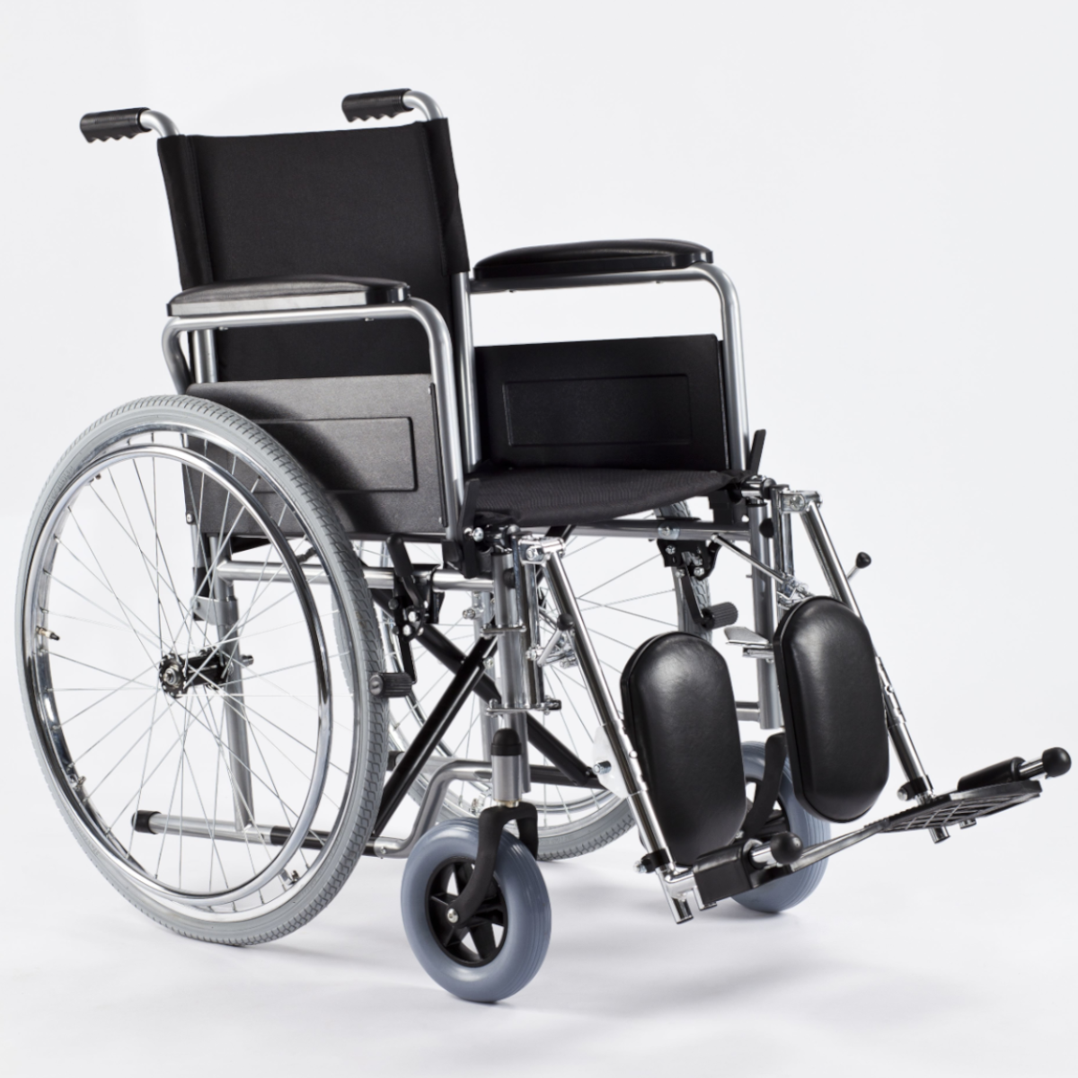 Wózek inwalidzki stalowy z długimi podnóżkami H011 Basic